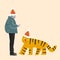 Contemporarty art collage of man in winter jacket and holiday hat standing near drawn tiger isolated over peach