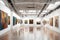 A contemporary art gallery featuring track lighting, white gallery walls, and a rotating exhibition