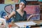 Contemporary artwork artist lady painting workshop