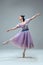 Contemporary ballroom dancer on grey studio background