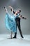 Contemporary ballroom dancers on grey studio background