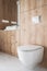 contemporary bathroom interior with toilet bowl and washbasin indoors