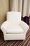 Contemporary beige comfortable armchair. Furniture