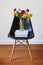 Contemporary black dining chair with yellow and purple flowers