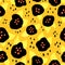Contemporary black and yellow flowers seamless pattern. Abstract florals on orange background. Repeating ditsy flower
