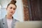 Contemporary Businesswoman Using Laptop in Office