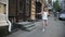 Contemporary caucasian ballet street dancer woman urban dancing freestyle in the city