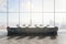 Contemporary concrete and wooden meeting room interior with bright panoramic window with city view and furniture. Workplace and