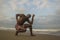 Contemporary dance choreographer and dancer doing ballet beach workout . a young attractive and athletic black African American