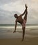 Contemporary dance choreographer and dancer doing ballet beach workout . a young attractive and athletic black African American