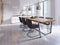 Contemporary dining room with large table and loft style chairs