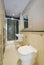 Contemporary en-suite bathroom in beige