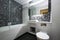 Contemporary en-suite bathroom in black and white