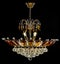 Contemporary gold chandelier isolated on black background. Crystal chandelier decorated amber crystals.