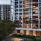 A contemporary high-rise apartment complex with eco-friendly features1