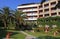 Contemporary hotel, garden and blue sky (Greece)