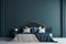 A contemporary interior design showcases a trendy monochrome deep blue color scheme in a modern bedroom. The empty wall