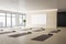 Contemporary interior of yoga classroom with blank banner on wall