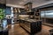 A contemporary kitchen featuring stainless steel appliances and sleek wood floors., A sleek, modern kitchen with stainless steel