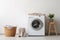 Contemporary Laundry Setup in a Clean Bathroom.