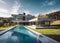 Contemporary luxury villa featuring a beautiful swimming pool. Ideal real estate, vacation destinations, and modern living