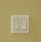 Contemporary modern electric light switches on wall. House home utilities interior details elements