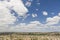 Contemporary Neighborhood and Majestic Clouds