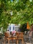 Contemporary outdoor dining area with a wooden table and chairs