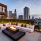 A contemporary rooftop terrace with comfortable seating, a fire pit, and panoramic views of the city1, Generative AI