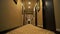 Contemporary room corridor. Modern light lobby interior. Point of view - walking down a hotel hallway. Empty Corridor in a