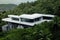 Contemporary Villa on Granite Rocks Surrounded by Dense Rainforest