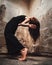 Contemporary woman dancer backbend with long hair