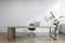 Contemporary wooden and concrete office interior with mock up place, workplace desk, laptop, chair, decorative plant, blinds and