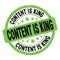 CONTENT IS KING text written on green-black round stamp sign