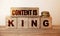 Content is King word concept on cubes. Marketing SEO business concept