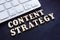 Content strategy from small letters and keyboard. SEO concept