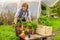 Contented young agriculturist working in the countryside