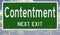 Contentment Next Exit road sign