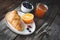 Continental breakfast with croissant, jam and fruits