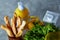 Continental breakfast with fresh pastry, fruits, greenery and beverages over light textured background, top view,