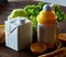 Continental breakfast with fresh pastry, fruits, greenery and beverages over light textured background, top view,