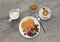 Continental breakfast of a Pancakes, fruit, and coffee, shot on