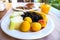 Continental, vegetarian breakfast served with fruits on the terrace of the restaurant. Morning, healthy food. Selective focus,