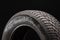 Continental Viking Contact 7-logo on the side of the tire closeup. one of the best winter friction tires. black