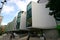 Continued and wavy gray facade of Vicki Sara Building with array of rectangular colorful windows, University Technology Sydney UTS