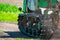 Continuous caterpillar tracks of the bulldozer. Close up detail of a metall crawler tractor tracks