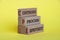 Continuous process improvement text on wooden blocks with yellow background. Business improvement and process