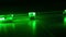 Continuous wave green laser propagates through the optical components. Laser Safety.