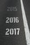 Continuous Year Numbers Count on asphalt road