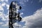 Contour small military radar station on background beautiful clouds and sky. Mobile relay station, Russia